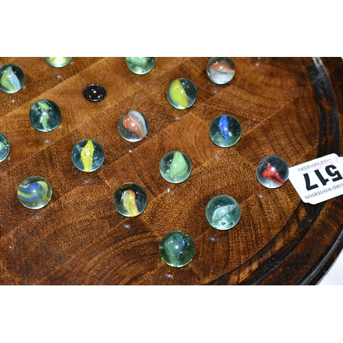 517 - A WOODEN BAGATELLE BOARD, complete with marbles, appears in fairly good condition with only minor ma... 