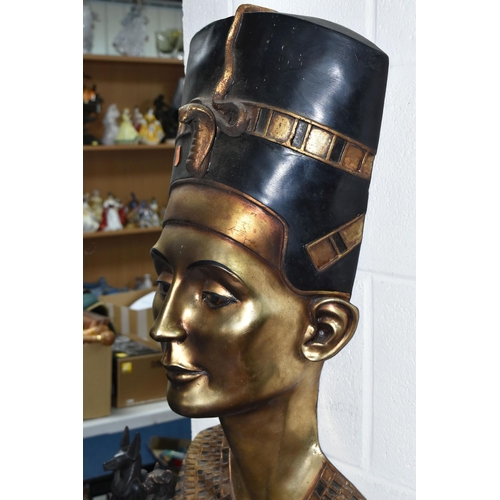 518 - A SMALL COLLECTION OF MODERN 'ANCIENT EGYPTIAN' THEMED ITEMS, to include a large wall decoration dep... 