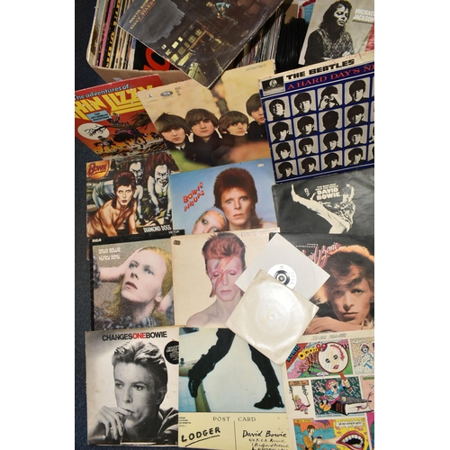 526 - TWO BOXES OF L.P AND SINGLE 45RPM RECORDS, over thirty L.P records to include David Bowie re-issue a... 