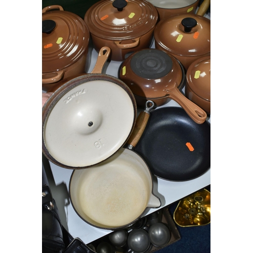 539 - TEN PIECES OF LE CREUSET CAST IRON COOKWARE, all with a cinnamon exterior, comprising a 27cm/4.1l ov... 