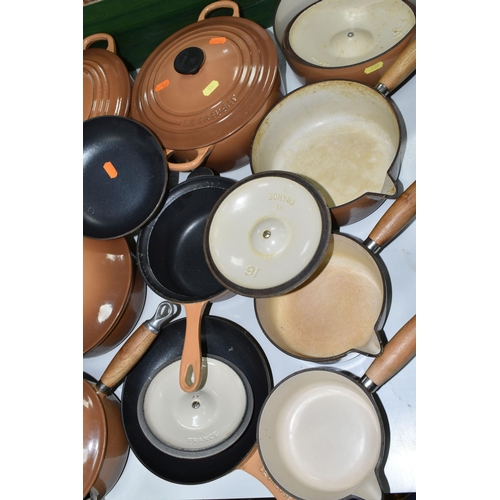 539 - TEN PIECES OF LE CREUSET CAST IRON COOKWARE, all with a cinnamon exterior, comprising a 27cm/4.1l ov... 