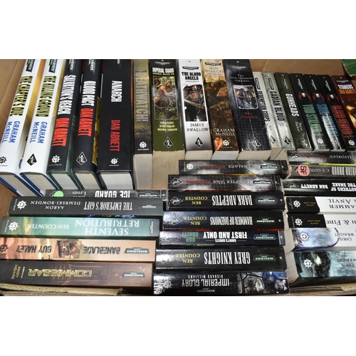 553 - TWO BOXES OF BOOKS containing sixty-two Warhammer titles, five in hardback format (list available) (... 