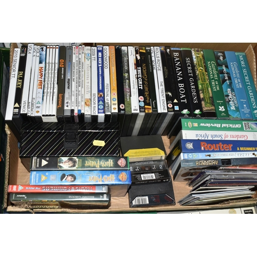 557 - FIVE BOXES OF L.P RECORDS, DVDS, VHS AND CDS, to include approximately thirty VHS cassettes and DVDs... 