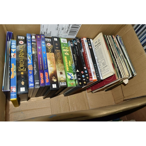 557 - FIVE BOXES OF L.P RECORDS, DVDS, VHS AND CDS, to include approximately thirty VHS cassettes and DVDs... 