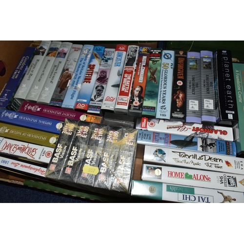 557 - FIVE BOXES OF L.P RECORDS, DVDS, VHS AND CDS, to include approximately thirty VHS cassettes and DVDs... 