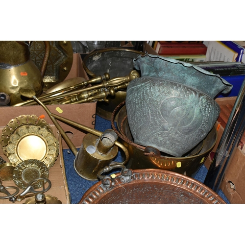 568 - TWO BOXES OF COPPER AND BRASSWARE, to include a brass chamber stick, horse brasses and ornaments, a ... 