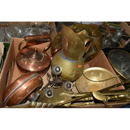 568 - TWO BOXES OF COPPER AND BRASSWARE, to include a brass chamber stick, horse brasses and ornaments, a ... 