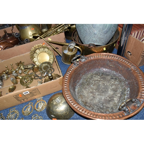 568 - TWO BOXES OF COPPER AND BRASSWARE, to include a brass chamber stick, horse brasses and ornaments, a ... 