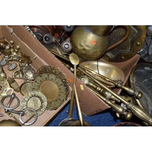 568 - TWO BOXES OF COPPER AND BRASSWARE, to include a brass chamber stick, horse brasses and ornaments, a ... 