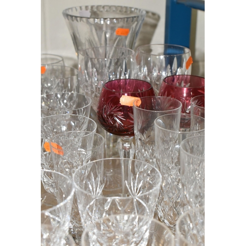 594 - A QUANTITY OF CUT CRYSTAL AND OTHER GLASSWARES, over eighty pieces to include at least ten sets of d... 