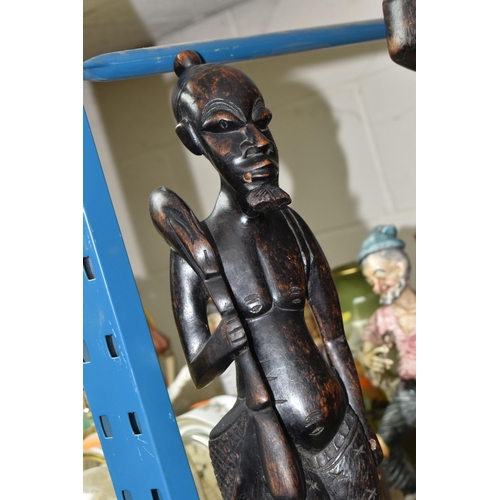 599 - CARVED WOODEN DECORATIVE ITEMS ETC, comprising three African tribal carvings, tallest a family group... 