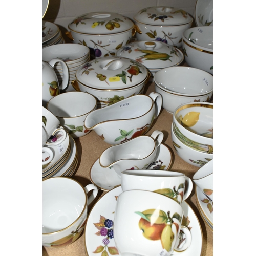 607 - ROYAL WORCESTER 'EVESHAM' PART DINNER SERVICE, comprising thirteen large cups and saucers, four smal... 