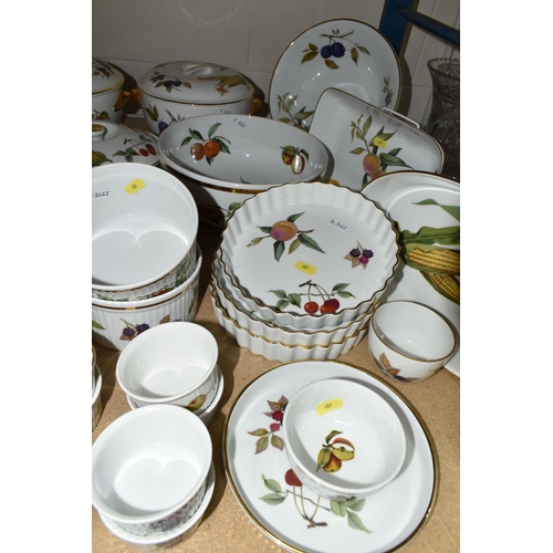 607 - ROYAL WORCESTER 'EVESHAM' PART DINNER SERVICE, comprising thirteen large cups and saucers, four smal... 