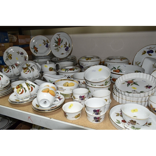 607 - ROYAL WORCESTER 'EVESHAM' PART DINNER SERVICE, comprising thirteen large cups and saucers, four smal... 