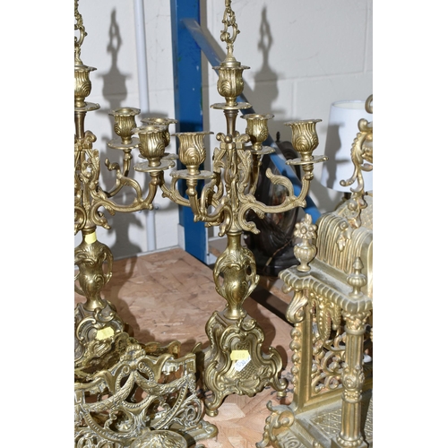 610 - A GROUP OF BRASS WARE, comprising an gilt Rococo style  mantel clock, bell striking mechanism stampe... 