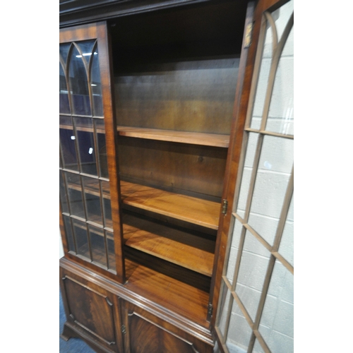 1424 -  A BEVAN FUNNELL MAHOGANY BOOKCASE, with two glazed doors and two cupboard doors, width 106cm x dept... 