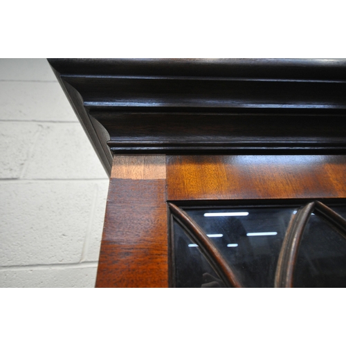 1424 -  A BEVAN FUNNELL MAHOGANY BOOKCASE, with two glazed doors and two cupboard doors, width 106cm x dept... 