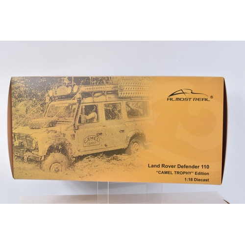 14 - A BOXED ALMOST REAL LAND ROVER DEFENDER 110   CAMEL TROPHY   EDITION 1:18 SCALE MODEL VEHICLE, numbe... 