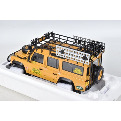 14 - A BOXED ALMOST REAL LAND ROVER DEFENDER 110   CAMEL TROPHY   EDITION 1:18 SCALE MODEL VEHICLE, numbe... 