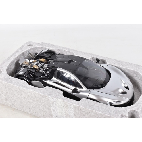 16 - A BOXED AUTOART SIGNATURE MODEL MCLAREN P1, 1:18 scale, numbered 76026 in matt chrome, appears in ne... 