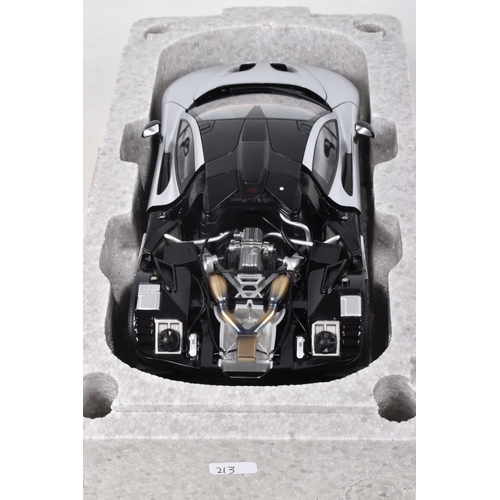 16 - A BOXED AUTOART SIGNATURE MODEL MCLAREN P1, 1:18 scale, numbered 76026 in matt chrome, appears in ne... 