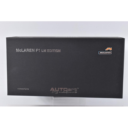 25 - A BOXED AUTOART SIGNATURE MCLAREN F1 LM EDITION 1:18 SCALE MODEL VEHICLE, orange body, appears in ne... 