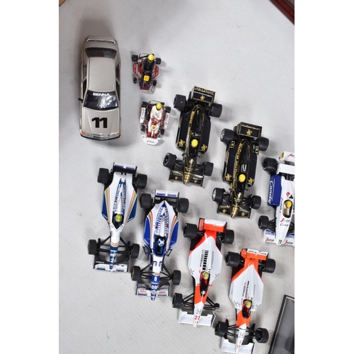 41 - A COLLECTION OF UNBOXED L.A.N.G. AND MINICHAMPS AYRTON SENNA RACING CAR COLLECTION MODELS, all 1/43 ... 