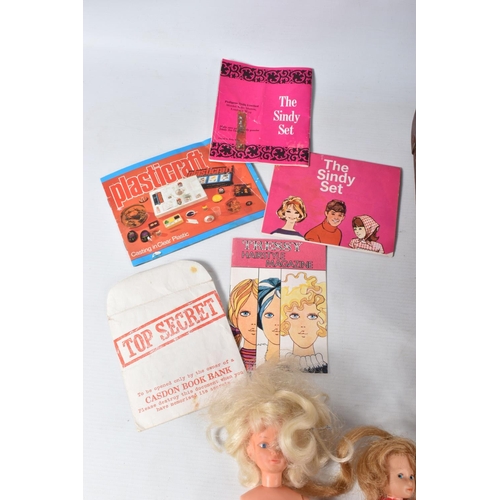 49 - A QUANTITY OF ASSORTED VINTAGE DOLLS, CLOTHING AND ACCESSORIES, to include Pedigree Sindy (back of h... 