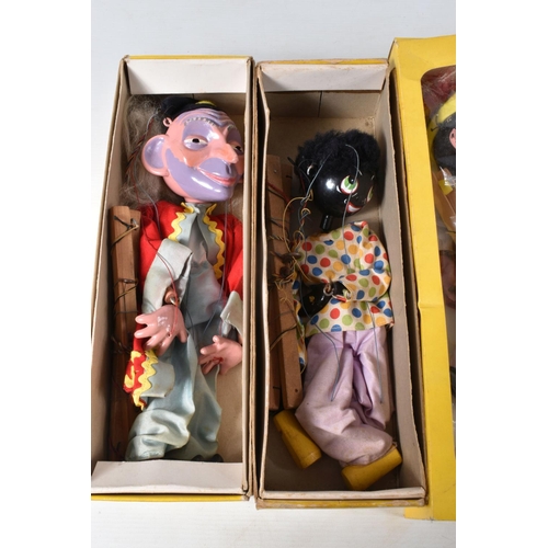 56 - SIX BOXED PELHAM PUPPETS, SL Pinocchio, LA Poodle, SM Witch, with broom, SS Mitzi, SS Golly and SL63... 