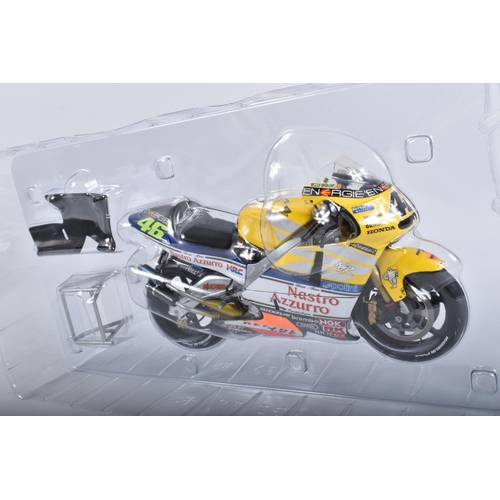 87 - TWO BOXED MINICHAMPS PAULS MODEL ART MOTORCYCLE MODELS 1:12 SCALE, the first is a Honda RC211V Repso... 