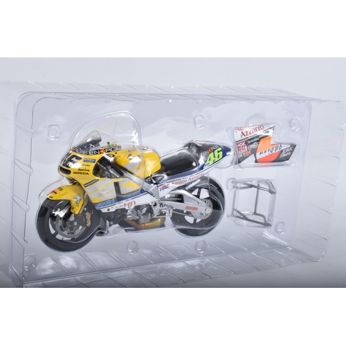 87 - TWO BOXED MINICHAMPS PAULS MODEL ART MOTORCYCLE MODELS 1:12 SCALE, the first is a Honda RC211V Repso... 