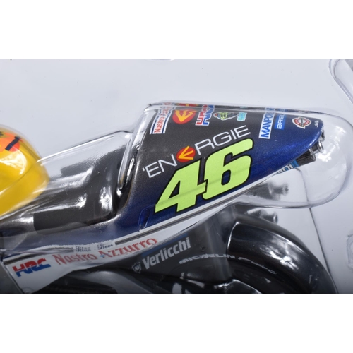 87 - TWO BOXED MINICHAMPS PAULS MODEL ART MOTORCYCLE MODELS 1:12 SCALE, the first is a Honda RC211V Repso... 