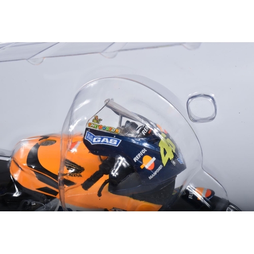 87 - TWO BOXED MINICHAMPS PAULS MODEL ART MOTORCYCLE MODELS 1:12 SCALE, the first is a Honda RC211V Repso... 