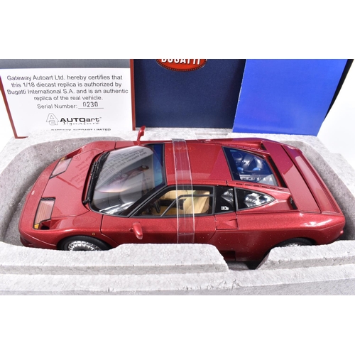 104 - A BOXED AUTOART SIGNATURE BUGATTI EB110GT 1:18 SCALE MODEL VEHICLE, numbered 70977, dark red in colo... 