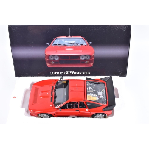 109 - A BOCED KYOSHO LANCIA 037 RALLY PRESENTATION 1:18 SCALE MODEL VEHICLE, numbered 08304R, in red, appe... 