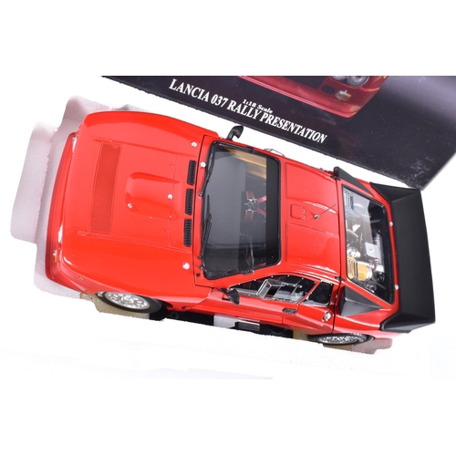 109 - A BOCED KYOSHO LANCIA 037 RALLY PRESENTATION 1:18 SCALE MODEL VEHICLE, numbered 08304R, in red, appe... 