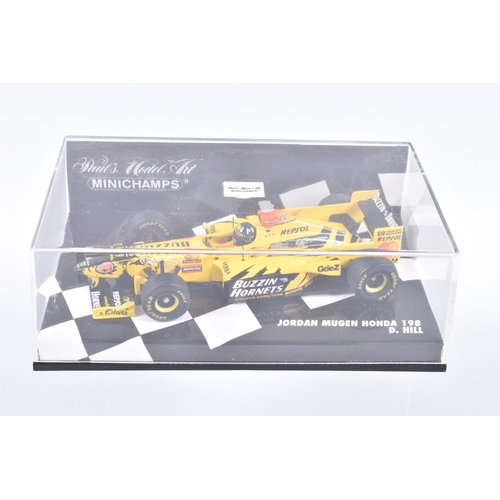 120 - FIVE MINIATURE MODEL CARS IN PLASTIC DISPLAY CASES  to include four Minichamp 1:43 Scale cars, a Ral... 