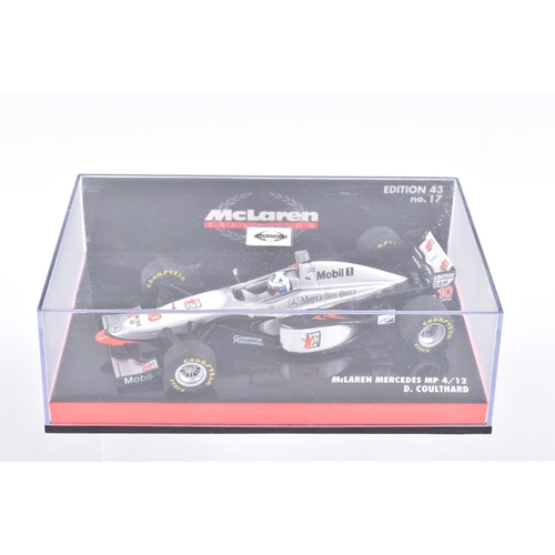 121 - FIVE MINICHAMP MODEL CARS IN PLASTIC DISPLAY CASES, all 1:43 scale, to include a McLaren Mercedes MP... 