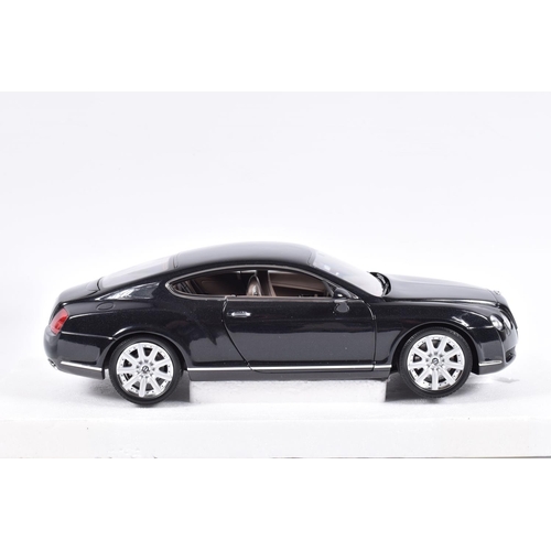 128 - A BOXED MINICHAMPS BENTLEY CONTINENTAL GT 1:18 SCALE MODEL VEHICLE, numbered 100 139020, black body,... 