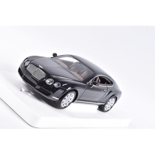 128 - A BOXED MINICHAMPS BENTLEY CONTINENTAL GT 1:18 SCALE MODEL VEHICLE, numbered 100 139020, black body,... 