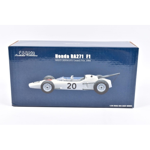 129 - TWO EBBRO PREMIUM COLLECTION HONDA RA271 F1 1:20 SCALE MODEL DIECAST VEHICLES, the first is a West G... 