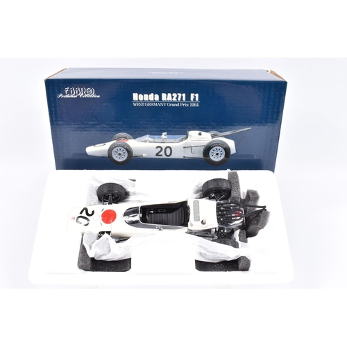 129 - TWO EBBRO PREMIUM COLLECTION HONDA RA271 F1 1:20 SCALE MODEL DIECAST VEHICLES, the first is a West G... 