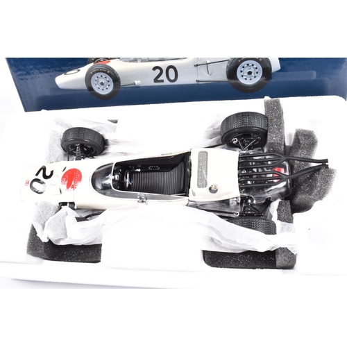 129 - TWO EBBRO PREMIUM COLLECTION HONDA RA271 F1 1:20 SCALE MODEL DIECAST VEHICLES, the first is a West G... 