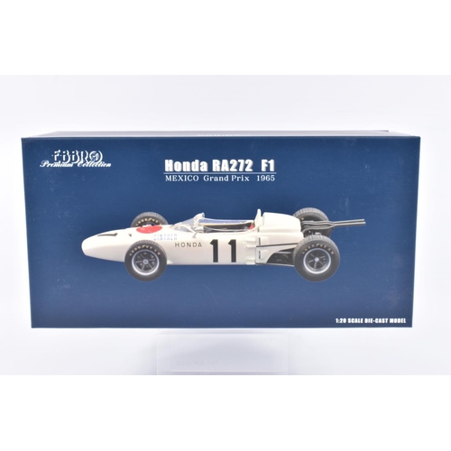 129 - TWO EBBRO PREMIUM COLLECTION HONDA RA271 F1 1:20 SCALE MODEL DIECAST VEHICLES, the first is a West G... 