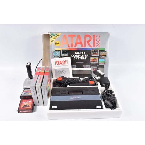 138 - A BOXED ATARI 2600 VIDEO COMPUTER SYSTEM, not tested, but appears complete with both controllers, tr... 