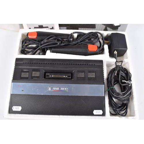 138 - A BOXED ATARI 2600 VIDEO COMPUTER SYSTEM, not tested, but appears complete with both controllers, tr... 