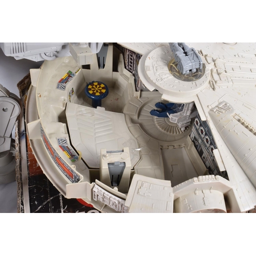 204 - A COLLECTION OF UNBOXED VINTAGE STAR WARS COLLECTIBLES, to include a 1979 CPG Millennium Falcon with... 