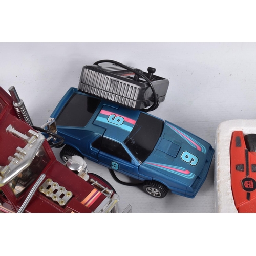 217 - A COLLECTION OF UNBOXED VINTAGE TOYS AND FIGURES, to include a Kenner MASK Rhino Tractor Rig 37300, ... 