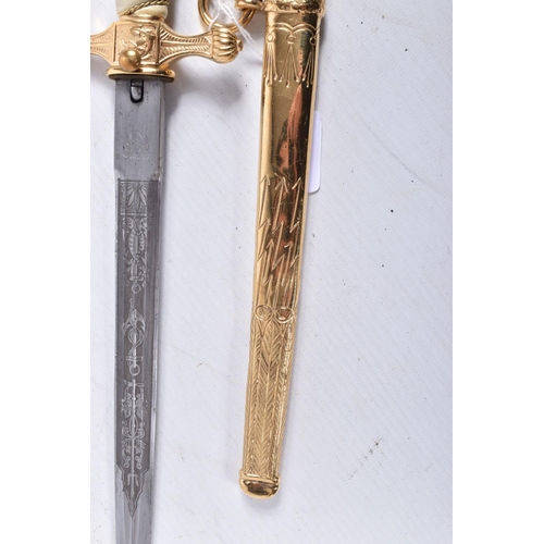 405 - A GERMAN KRIEGSMARINE OFFICERS DRESS DAGGER, this is in good condition, has a white celluloid grip w... 