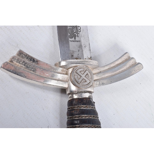 406 - A GERMAN LUFTWAFFE OFFICERS DRESS DAGGER, this has plated mounts, hanger, comes in a dark blue scabb... 